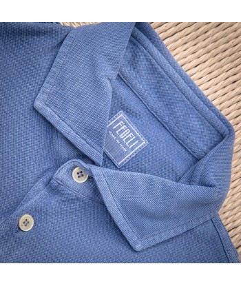 Polo manches courtes piqué de coton bleu jean de la marque